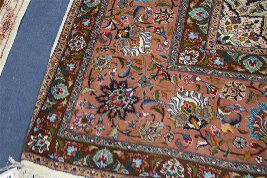 A Tabriz cream ground medallion carpet 400 x 305cm